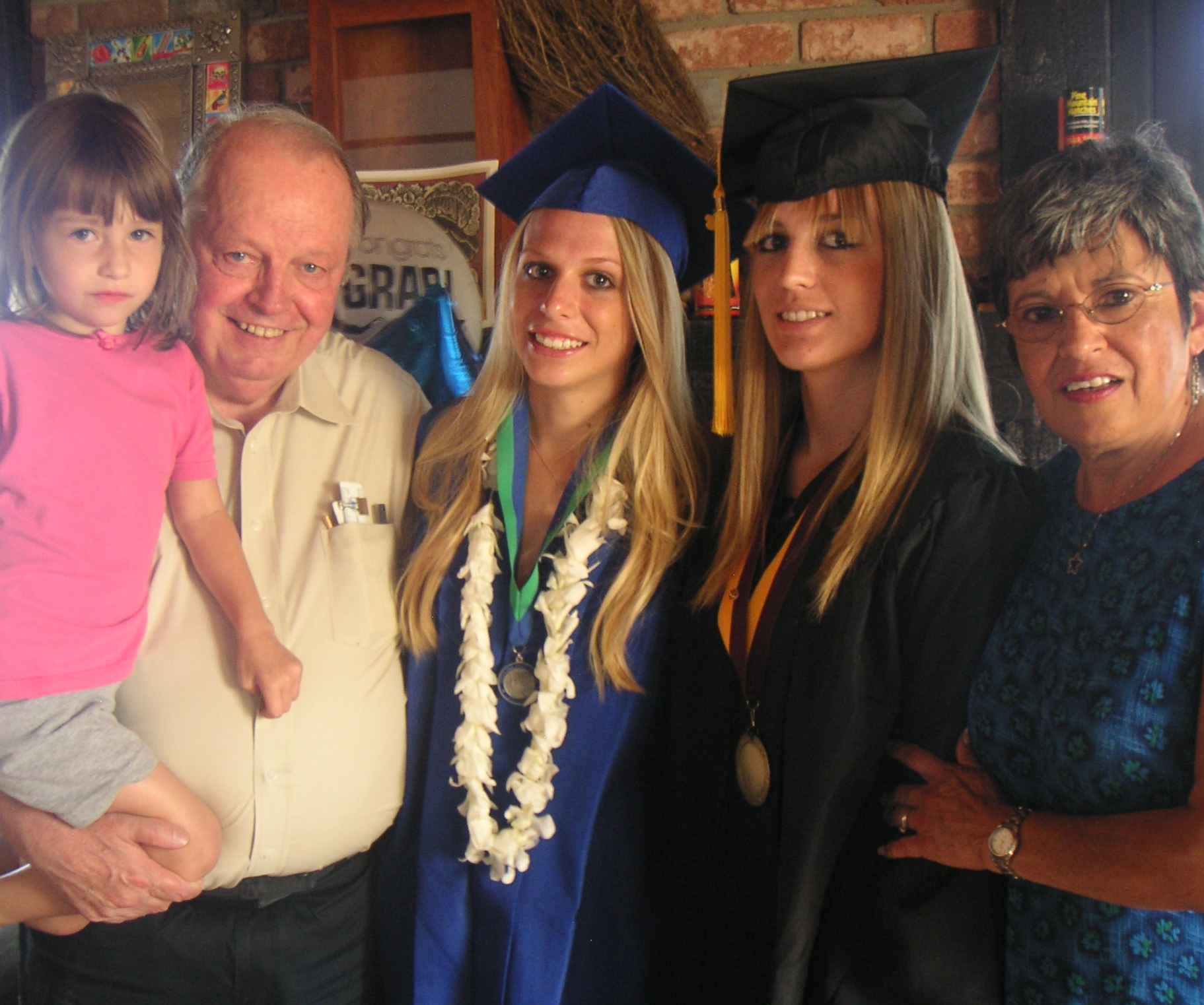 Grandma, grandpa, & the 3 grads